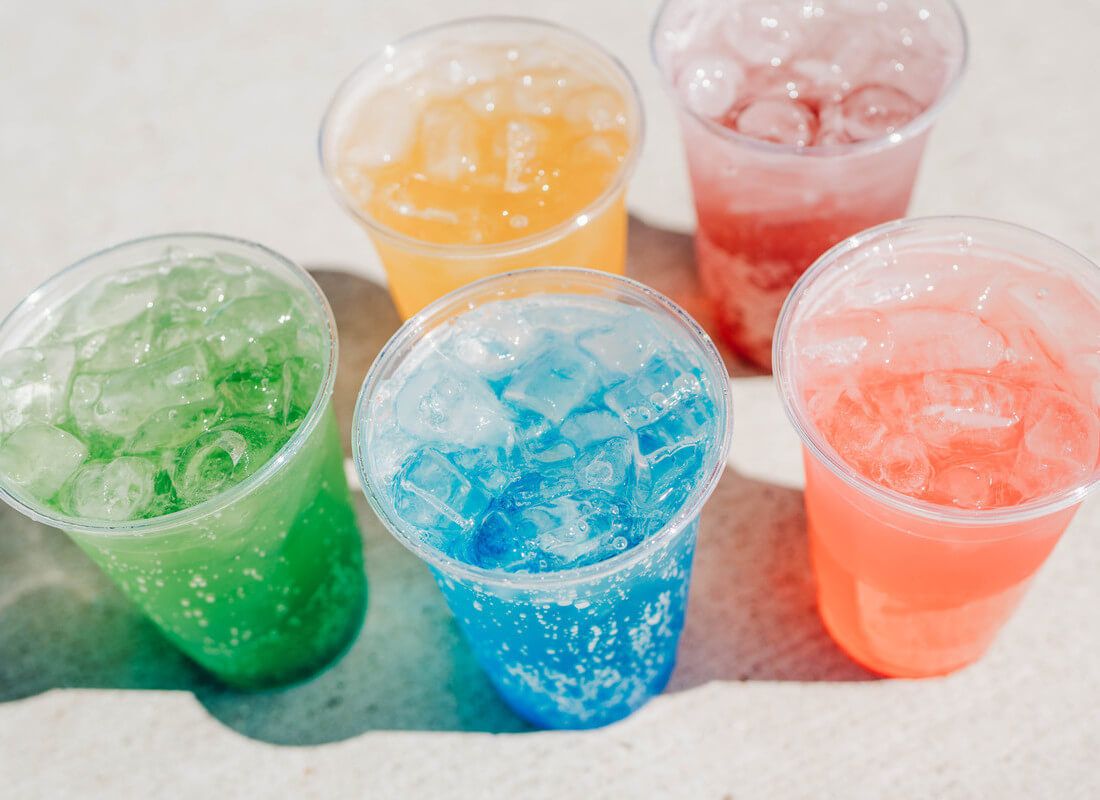 Overhead view of 5 different colored Twist beverages